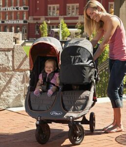 side by side double stroller with bassinet